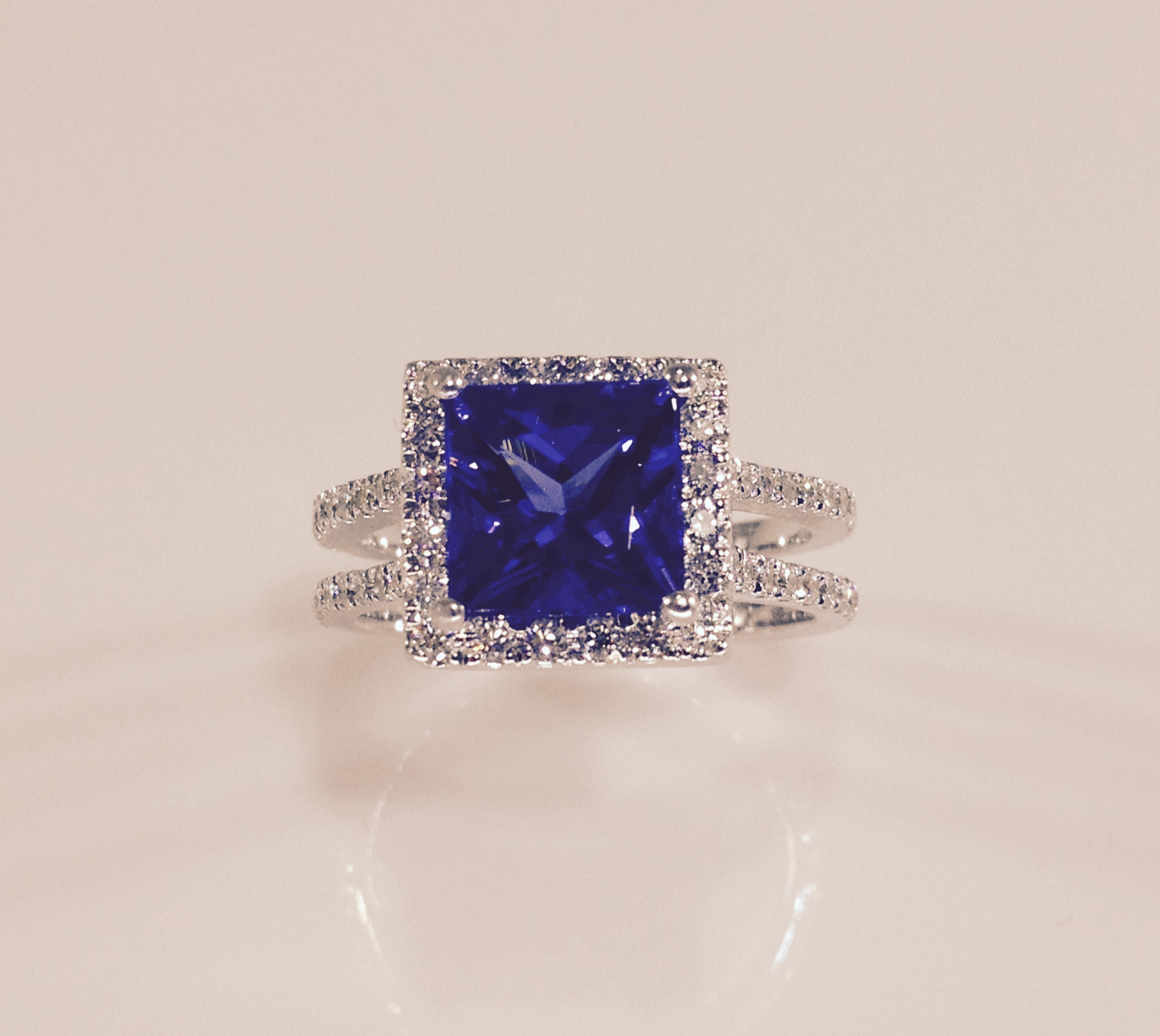 custombluetopazhaloengagementring20.jpg