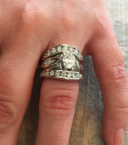 customhaloengagementringwithtwoweddingbands.jpg